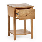 Front view of the Coxmoor oak bedside table with the top drawer pulled open.