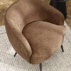 Overhead three-quarter view of the Dahlia curved barrel accent chair in rust brown