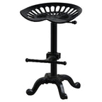 Front view of the adjustable industrial tractor seat bar stool with black cast iron base and footrest bar