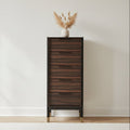 Ebony 5-drawer narrow tallboy chest styled with vase in modern bedroom layout
