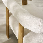 Close-up detail of the durable neutral fabric and plush cushion stitching on the Freya sofa