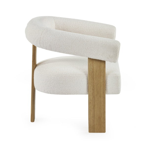 Side profile of Freya Armchair showing silhouette of slanted armrest