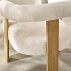 Close-up detail of tactile white boucle teddy fabric on the Freya accent chair