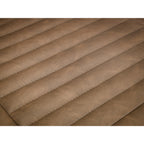 Close-up view of the ribbed quilted stitching on the vintage brown faux leather seat cushion.
