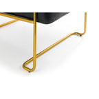 Side angle view of the Giorgio faux leather occasional chair showing gold legs with rubber detail