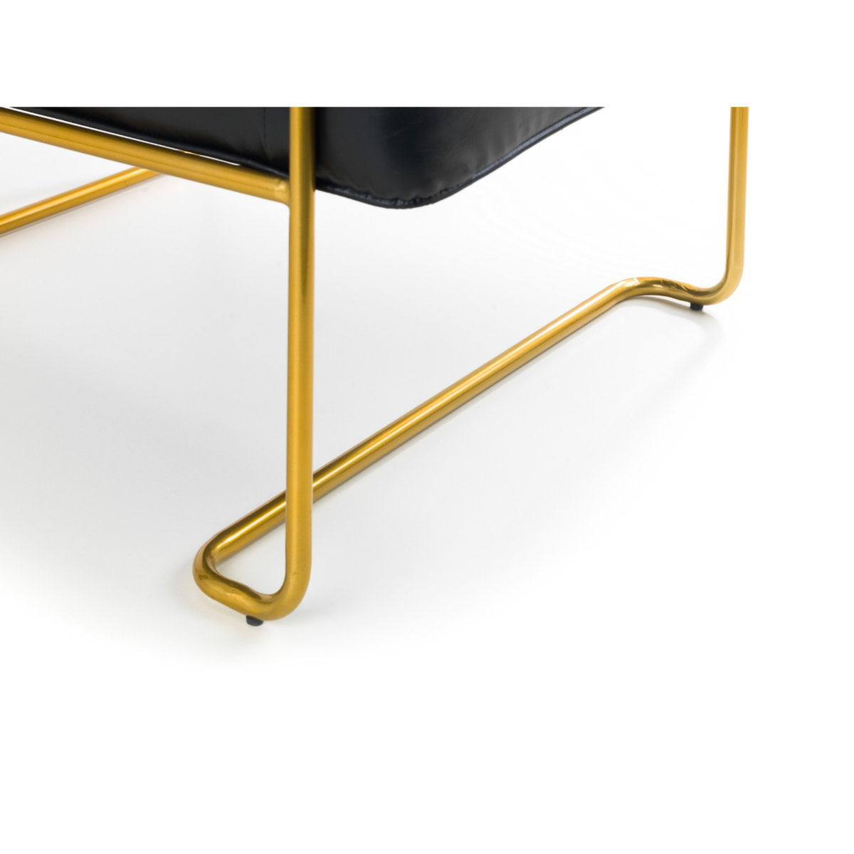 Side angle view of the Giorgio faux leather occasional chair showing gold legs with rubber detail