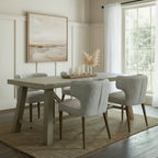 Haldon wooden large dining table styled in a dining room with boucle chairs on a natural woven rug 