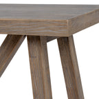 Close-up shot of the natural wood grain texture and tabletop corner finish on the Haldon console table