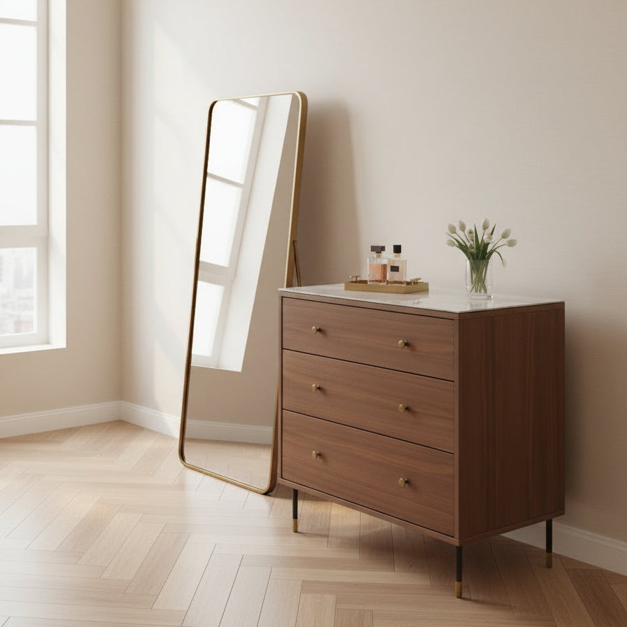 Contemporary tobacco walnut bedroom chest featuring three soft-close drawers and slender black cylindrical legs