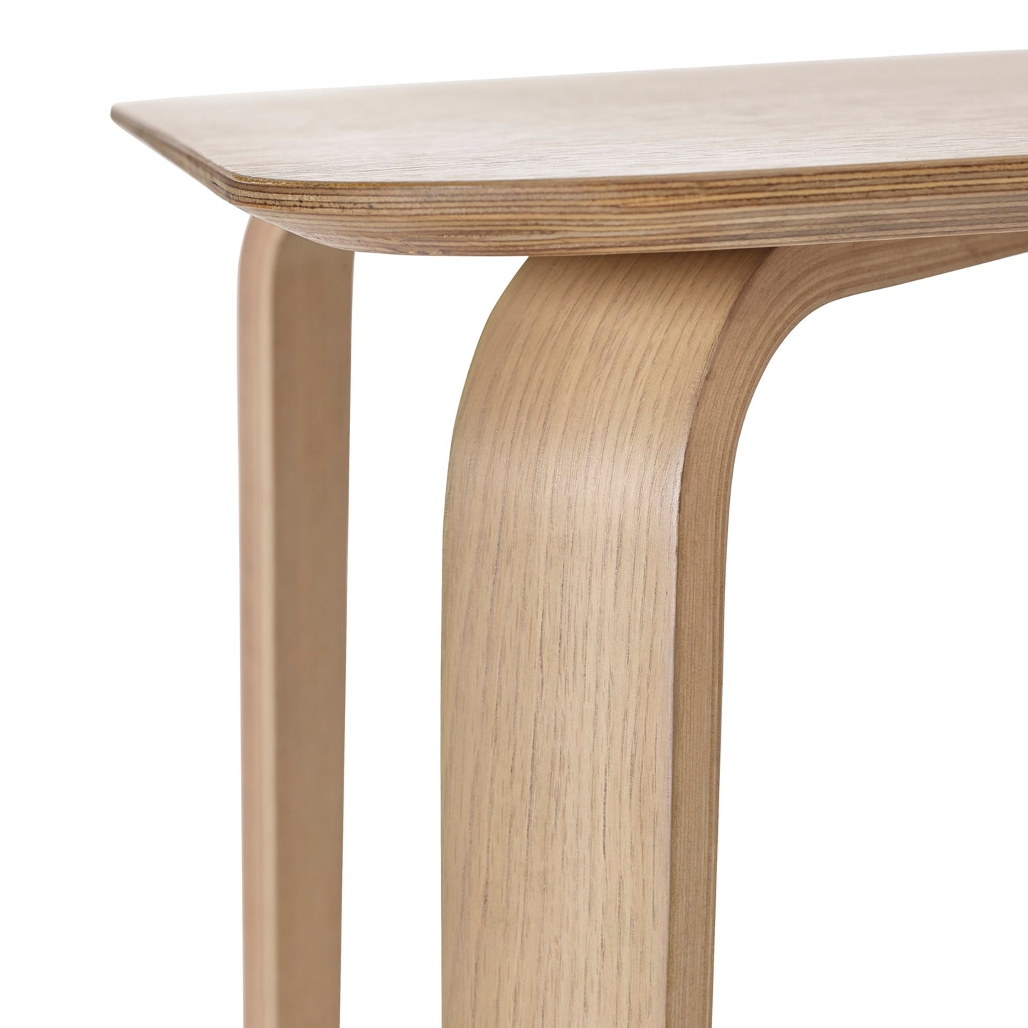 Detailed studio view highlighting the seamless bentwood leg joint on the Kaito oak wooden dining table