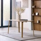 Kaito oak wooden dining table styled on a textured grey rug in a bright Scandinavian dining space