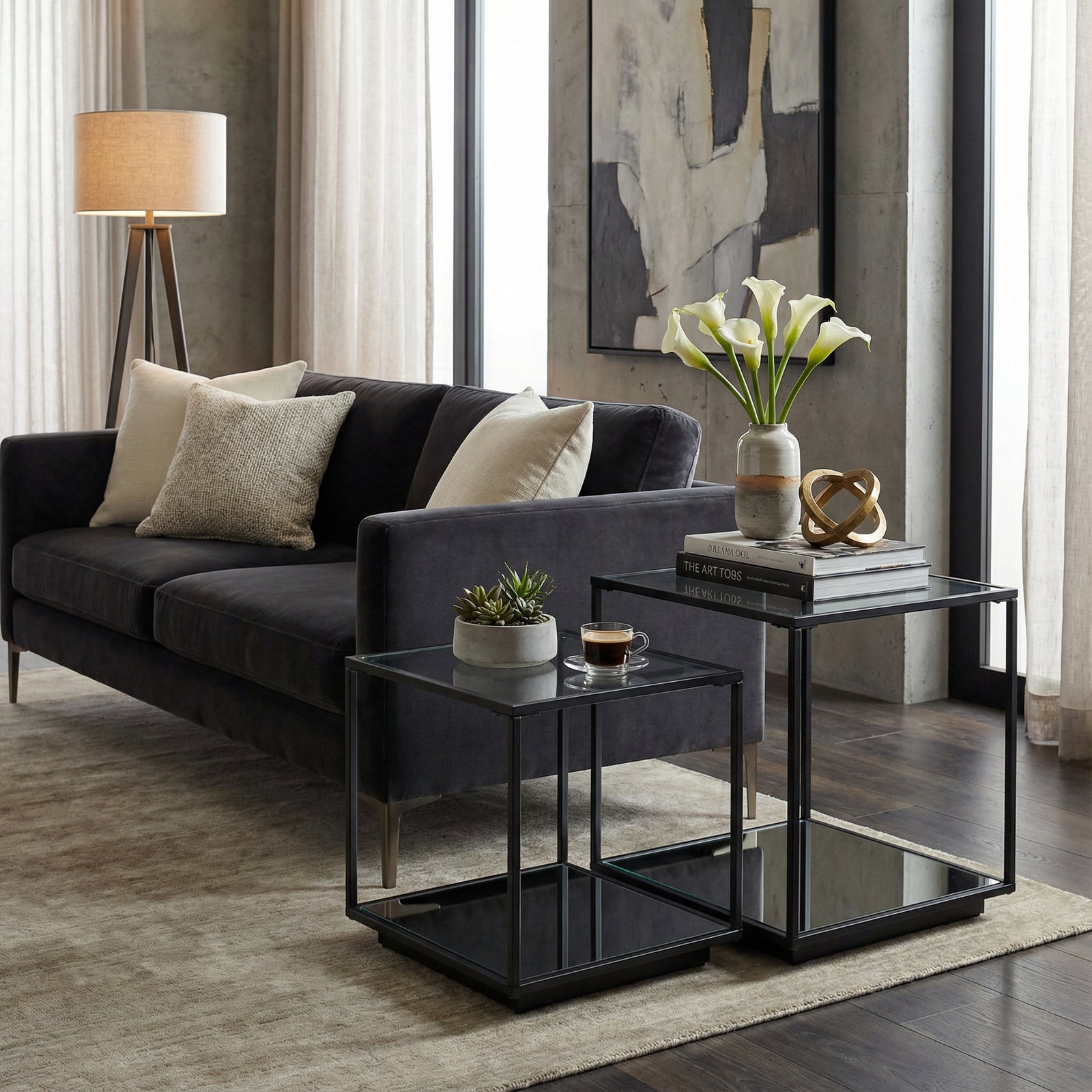 Lennox Black Framed Set of 2 Side Tables styled beside a sofa in a modern living room setting.