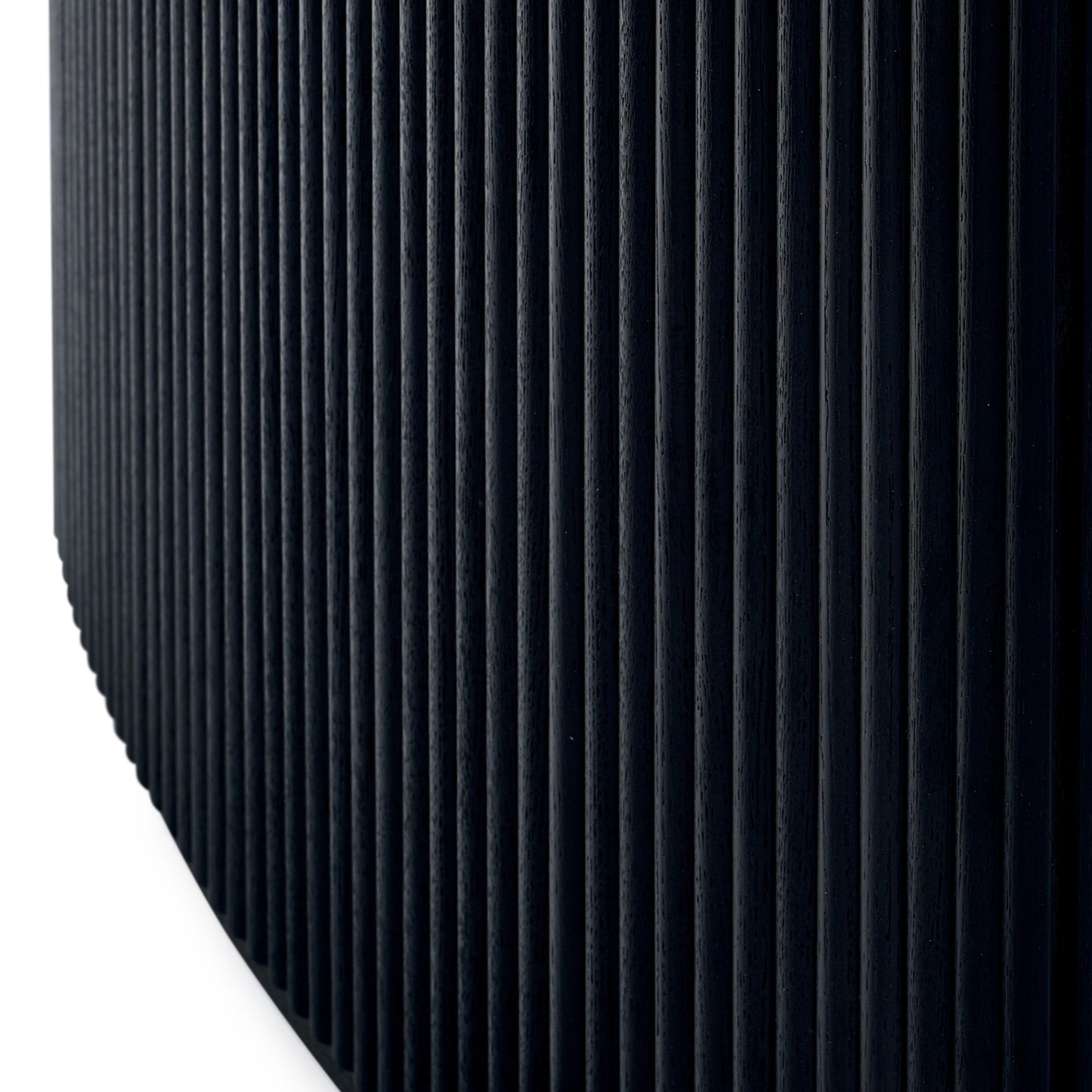 Close-up view of the vertical reeded fluted detail on the curved pedestal base of the Louis dining table