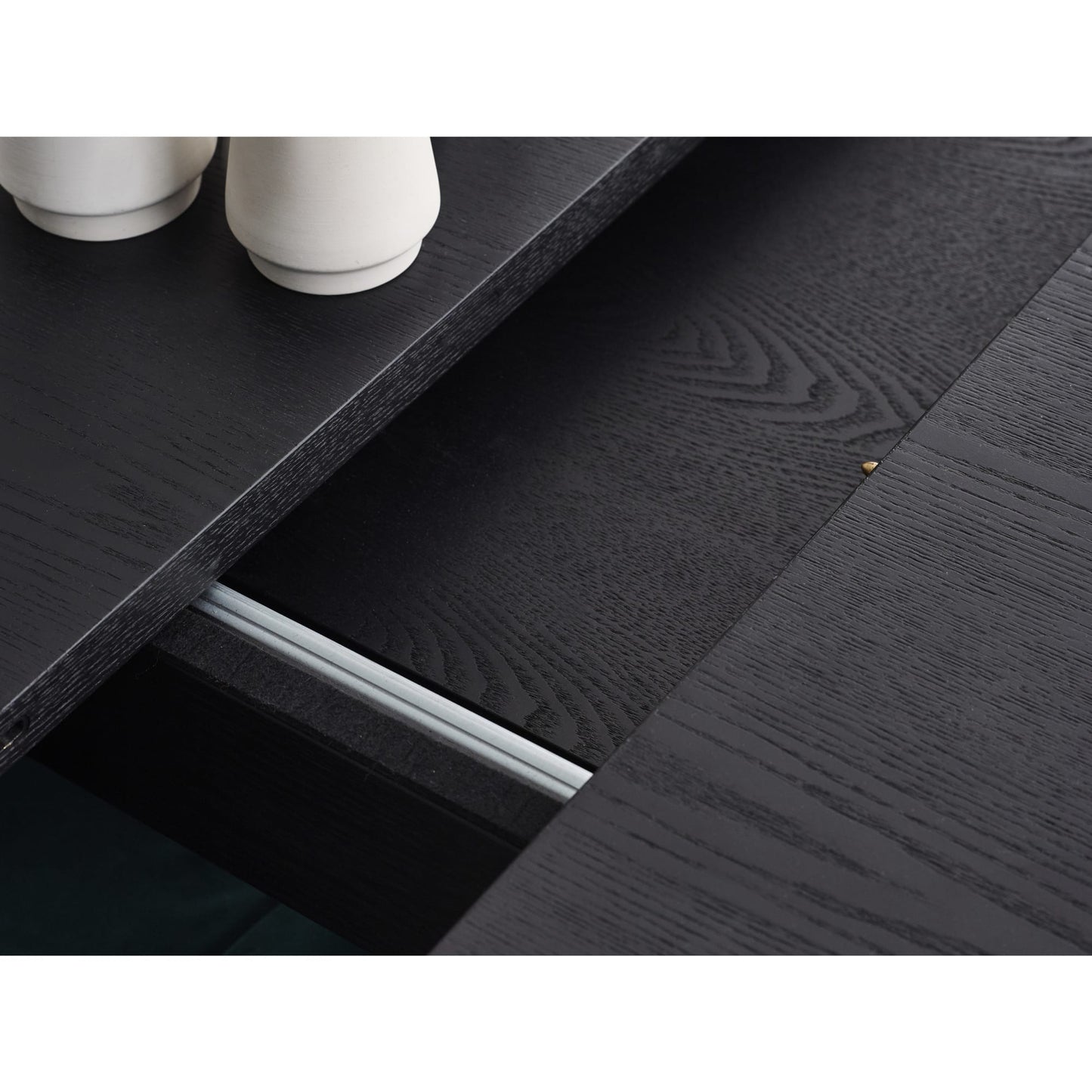 Detail shot showing the smooth metal sliding track mechanism beneath the Louis extending table top