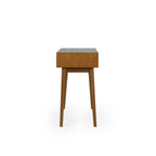 Side profile view showing the slim depth and splayed tapered legs of the Lowry writing desk