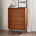 Lowry Cherry Ash 5 drawer tallboy chest styled in a modern bedroom setting