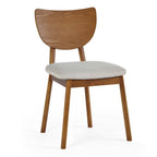 Front perspective studio shot of the Lowry dining chair featuring an exquisite cherry ash veneer frame and padded seat