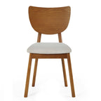 Direct front view studio shot of the Lowry dining chair showing the rounded backrest and neutral cushioned seat