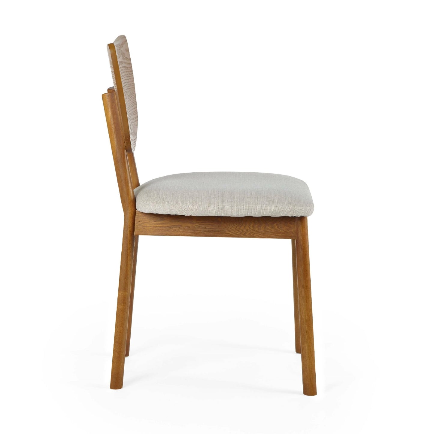 Side profile studio view showing the splayed tapered legs and sloped backrest profile of the Lowry chair