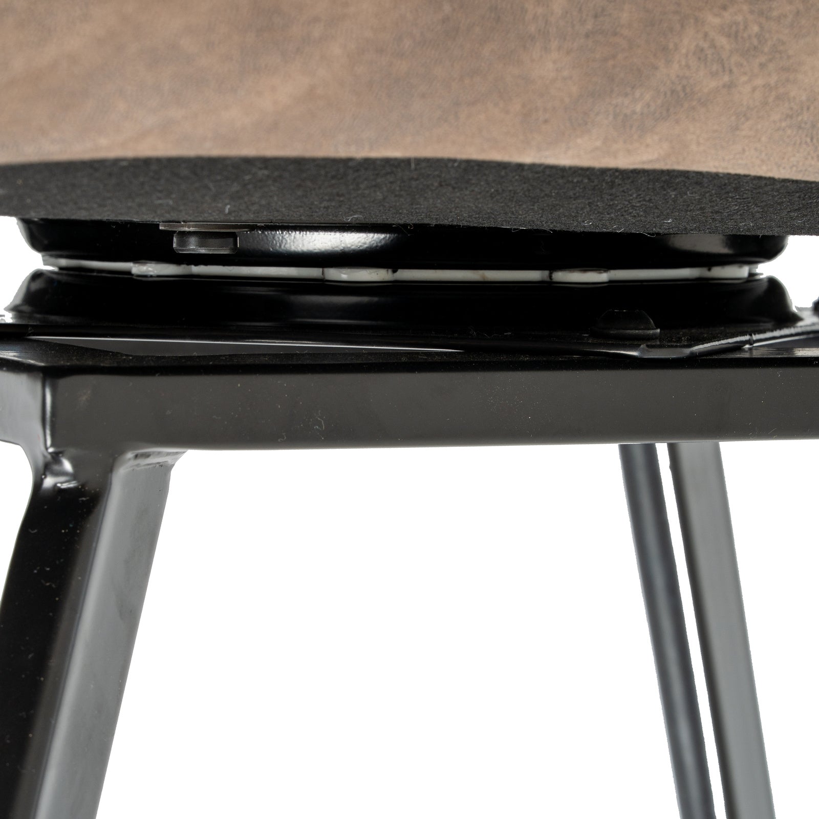 Detail shot showing the heavy-duty metal swivel plate mechanism beneath the Malmo dining chair seat