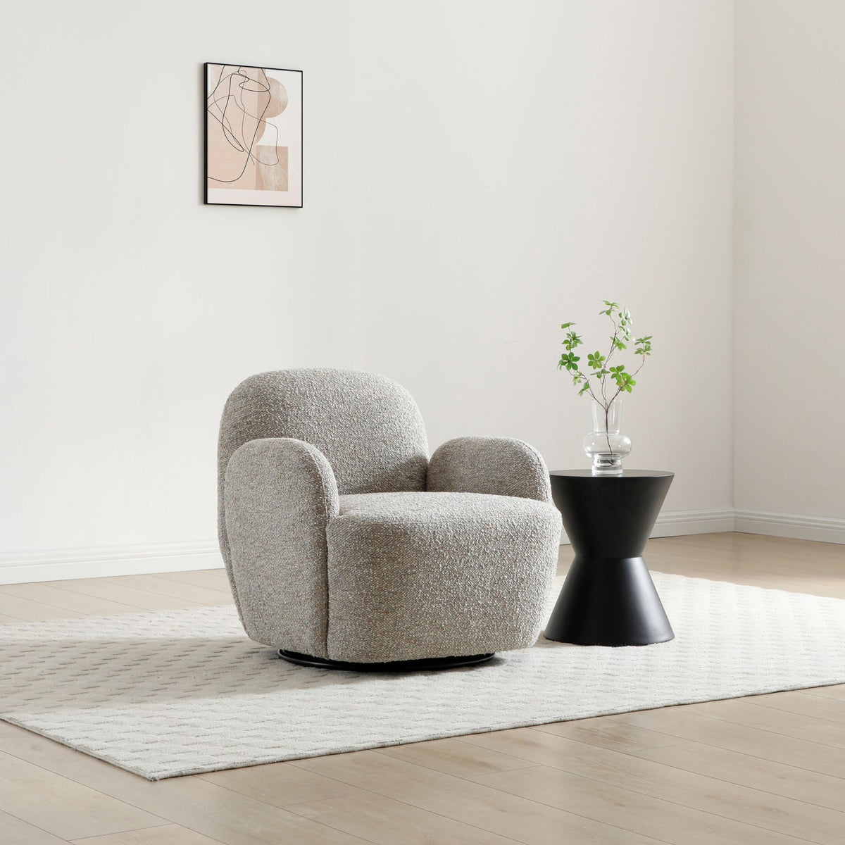 Micky 360 swivel armchair in light mist fabric set in an elegant home interior   
