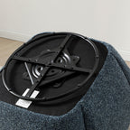 Underneath view displaying the sturdy circular metal 360-degree swivel base mechanism on the Micky chair   