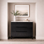 Contemporary Orchid  black oak chest of drawers with sleek marbled glass top and stylish cut-out handles