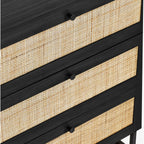 Close-up shot of the woven cane rattan detailing on the black oak 3 drawer chest