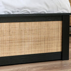 Detailed shot of the woven cane inlay on the black oak footboard