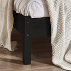 Detailed view of the corner leg and black oak wood finish on the Padstow bed