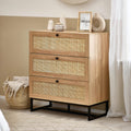 Padstow natural oak 3 drawer chest with rattan fronts styled in a modern bedroom