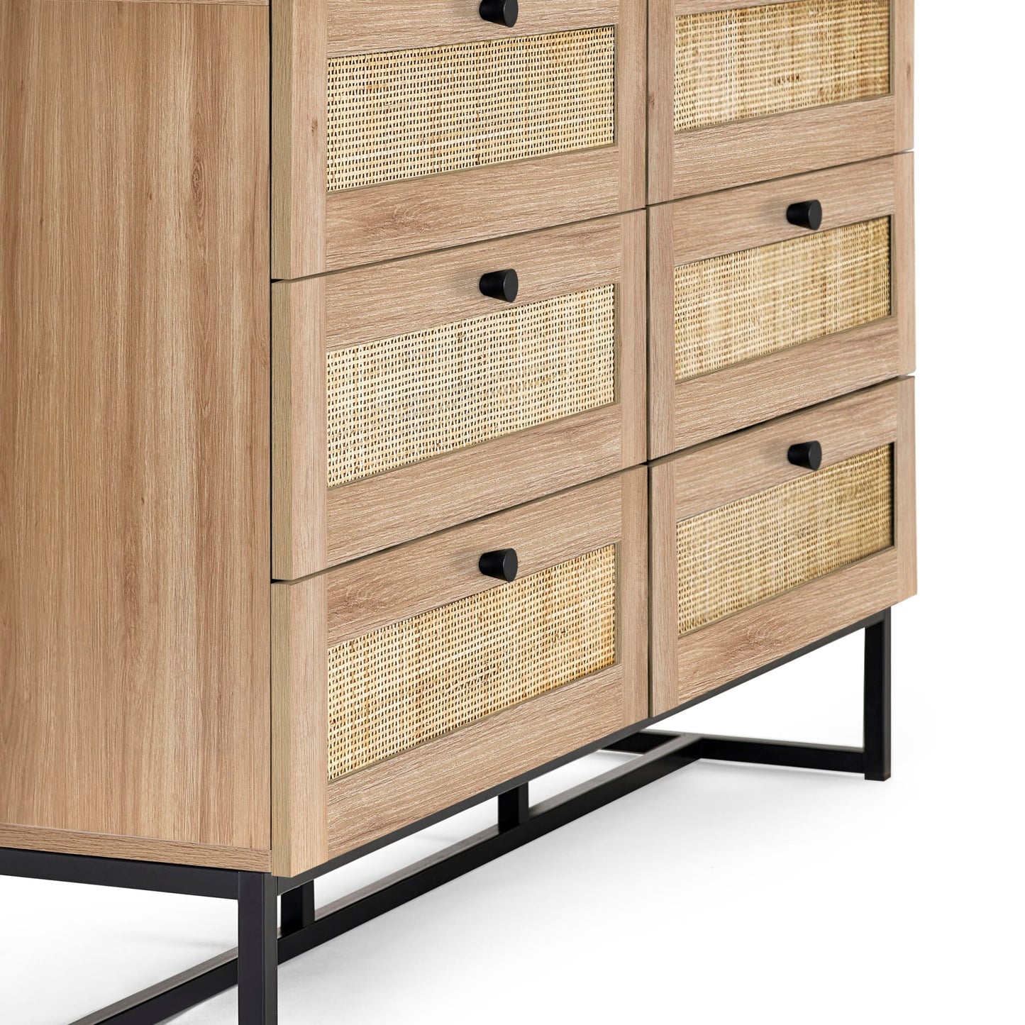 Side angle view showing the metal base frame and natural oak finish of the Padstow 6 drawer chest