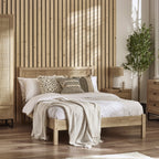 Padstow natural oak wood bed frame with cane headboard in a styled bedroom