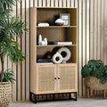 Front view studio shot of the Padstow natural oak tall bookcase with rattan cupboard doors
