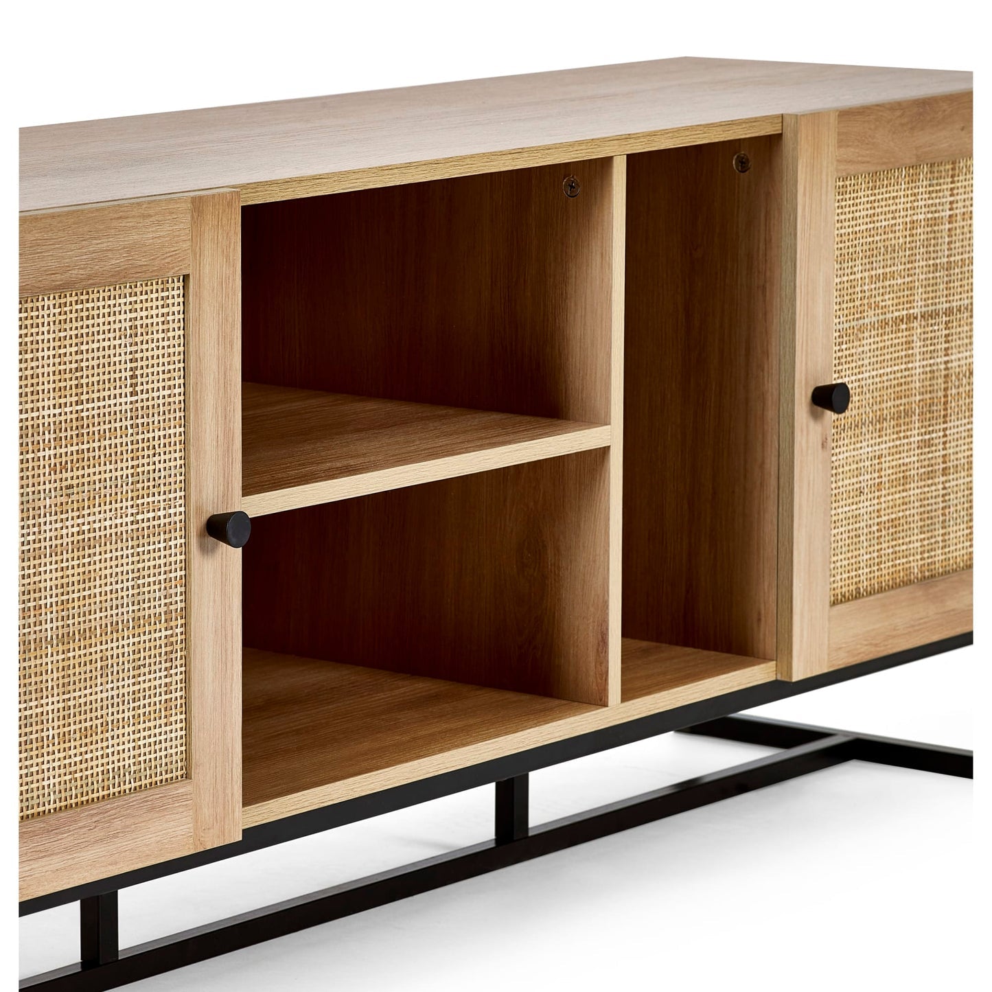 Close-up view of woven natural cane doors and central shelving on the oak Padstow media unit