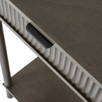 Close-up shot showing the black metal lip handle and vertical fluted texture on the 2 console table drawers