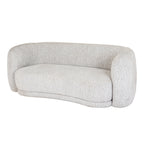Perspective view highlighting the soft rounded armrests and low-profile backrest of the Sorelle boucle 2 seater sofa