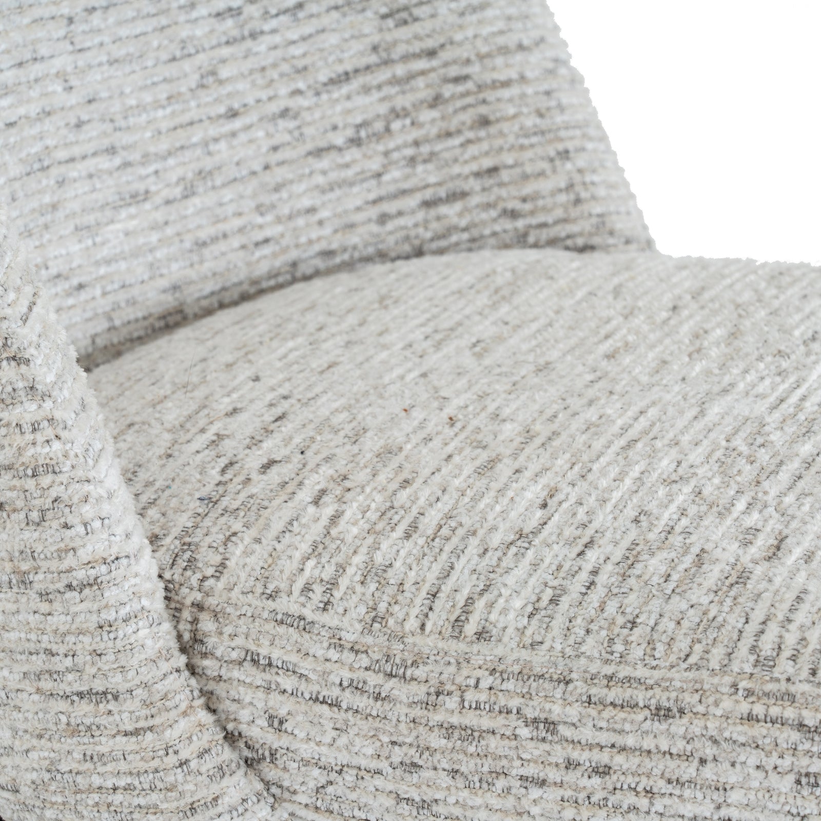 Close-up shot of the multi-tonal textured bouclé fabric weave on the seat cushion of the Sorelle chair