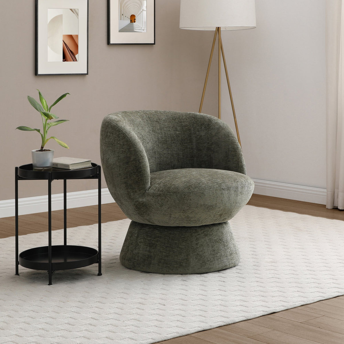 Muted green Tulip swivel armchair set beside a side table in a bright room   