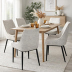 Set of Zephra Upholstered Dining Chairs styled around a light wood dining table.